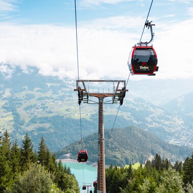 Golmerbahn-Gondelbahn am Erlebnisberg Golm im Montafon, umgeben von alpiner Berglandschaft | © Golm Silvretta Lünersee Tourismus GmbH Bregenz, Mathaeus Gartner